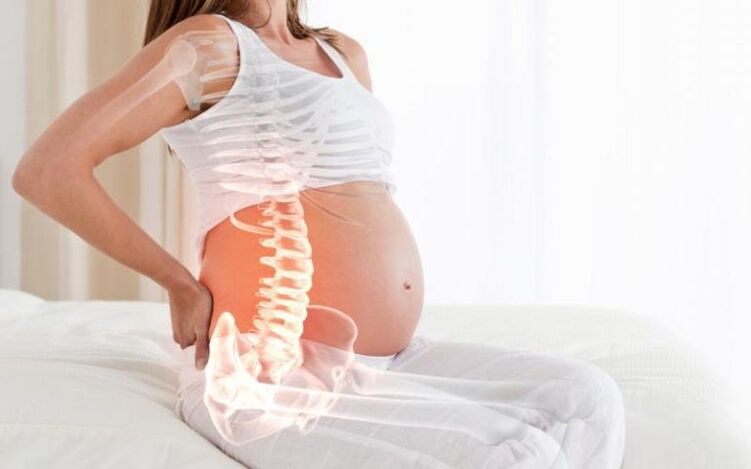 As mulleres embarazadas teñen dor na columna vertebral entre os omóplatos debido ao aumento da tensión nos músculos das costas